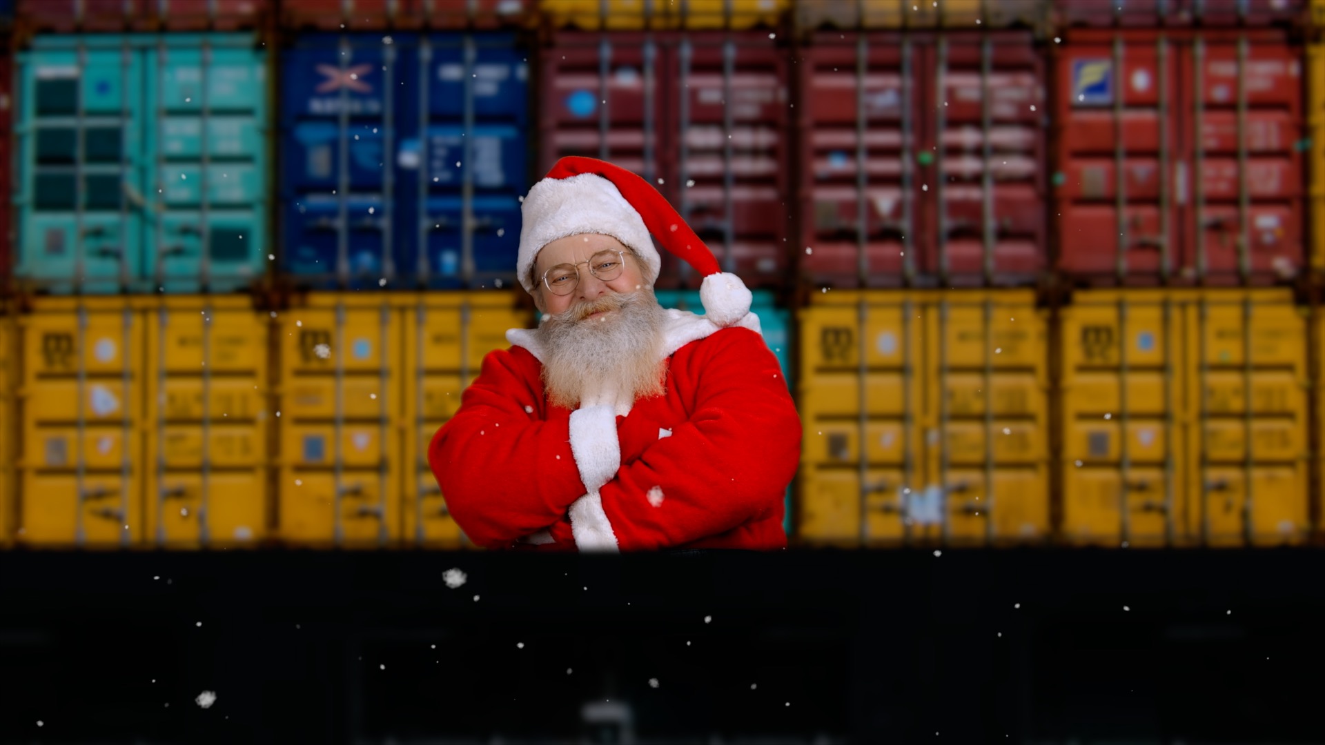 Santa standing on stern of a ship